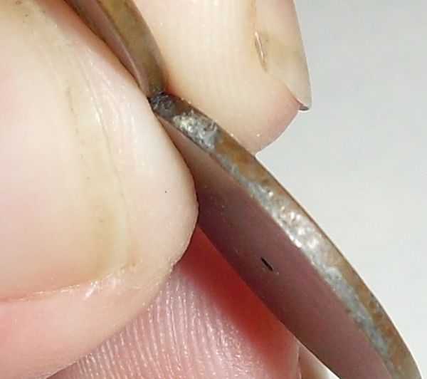 Help-With-Two-Pennies;-Both-Cut,-One-With-No-Reverse..?